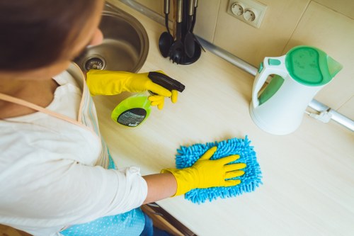 Post-renovation cleaning in a Hollandpark property with dust removal in progress