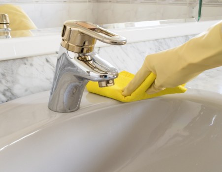 Clean glass and frames during Hollandpark window cleaning service